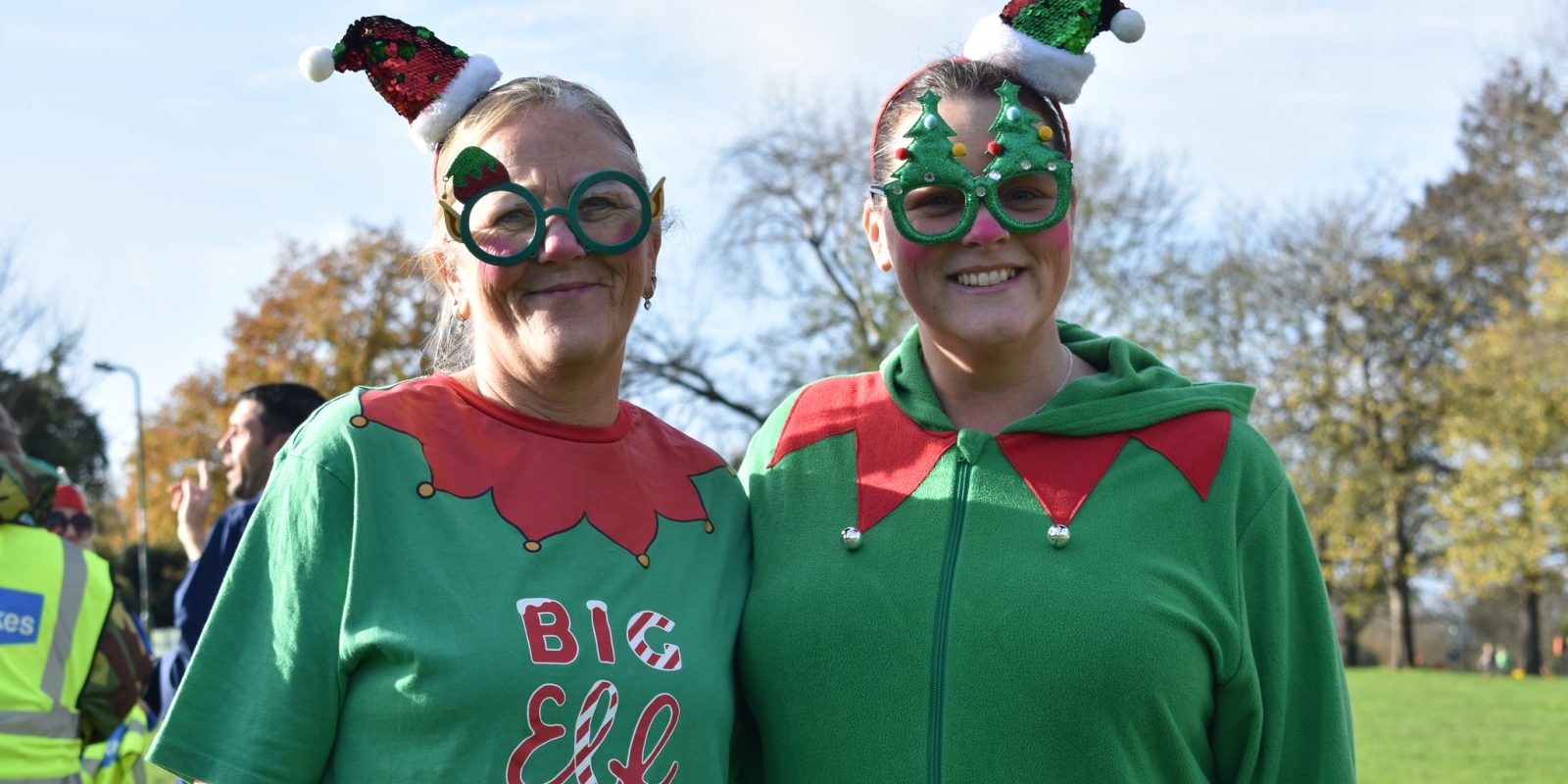 Two women dressed as elves