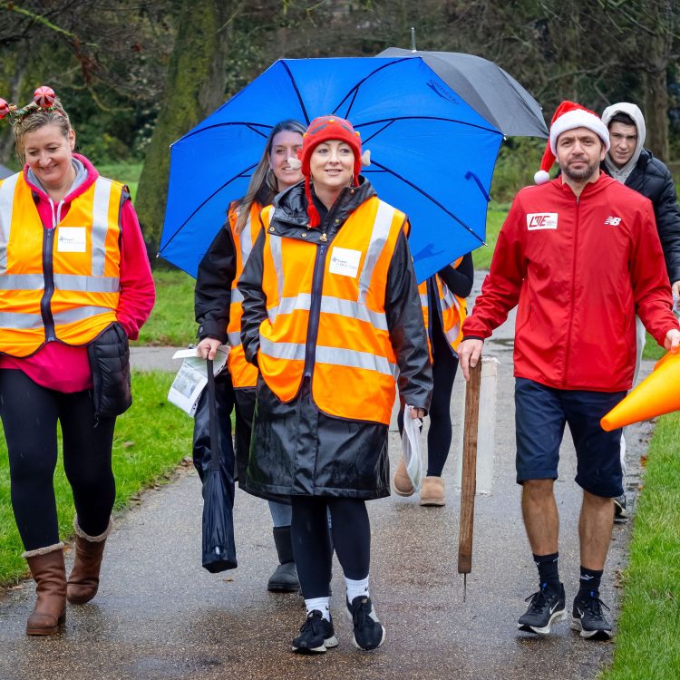 Helpers return from marking out the course