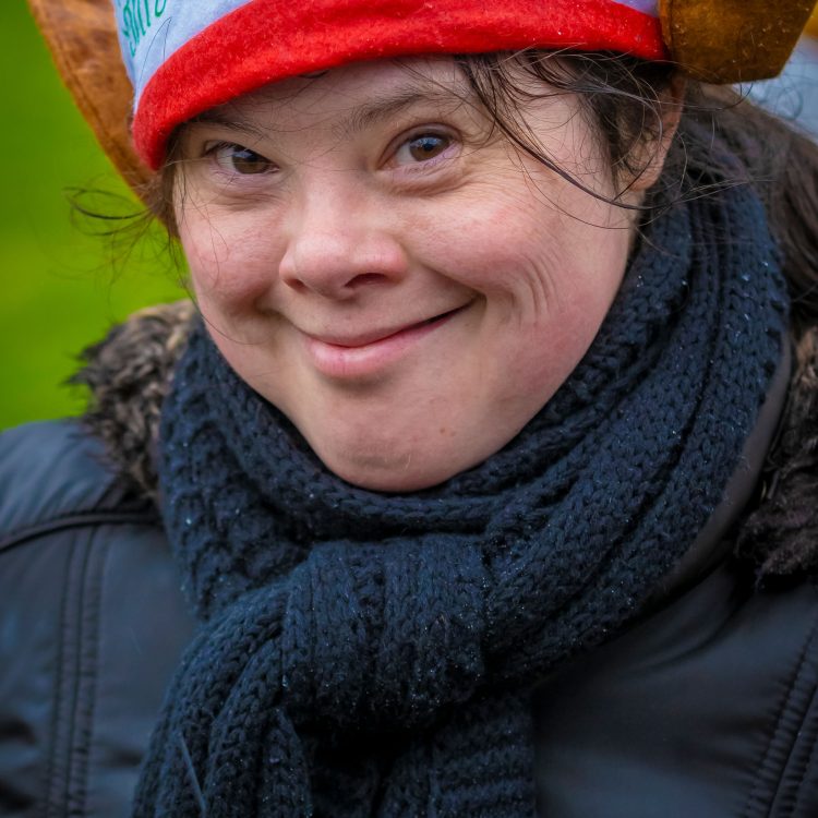 Portrait shot of smiling young woman in elf hat
