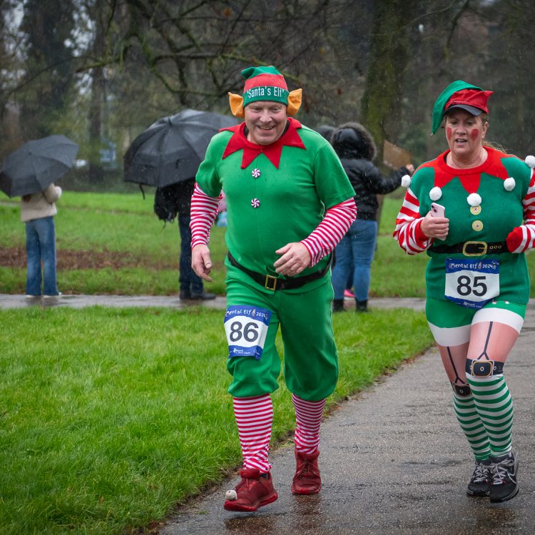 Man and woman in elf costumes during the fun run