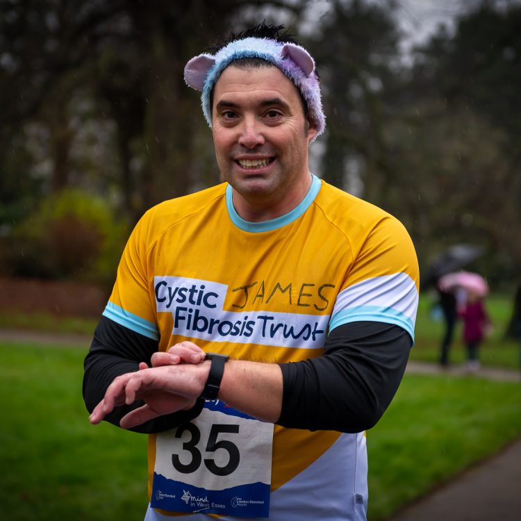 A runner smiling at the camera
