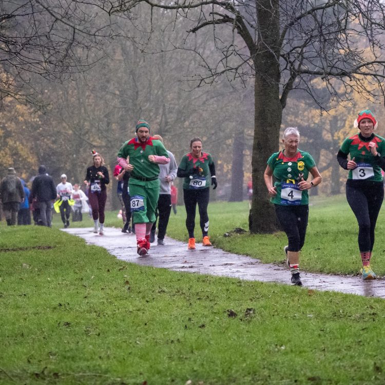 Runners in elf outfits