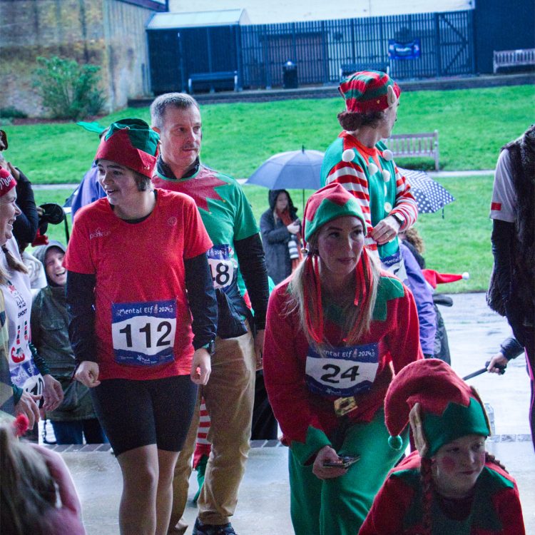 Runners dressed as elves